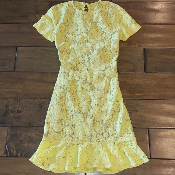 Adorable yellow fully lined form fitting mini dress size 0 - Picture 2 of 7